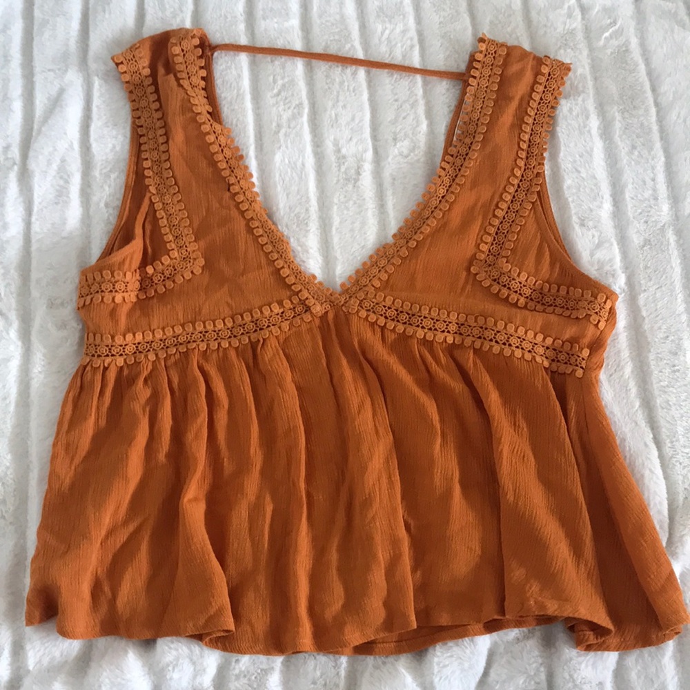 orange low cut top